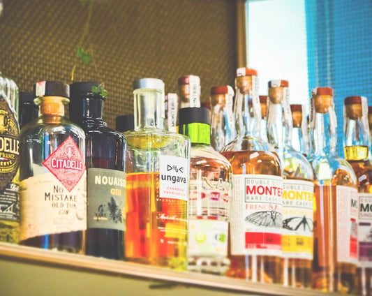 Do Whisky and Rum age in the bottle ?